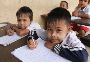 Two boys in migrant learning center classroom